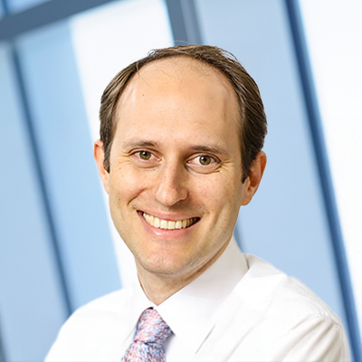 Headshot of Eduard Van Nes smiling at the camera.