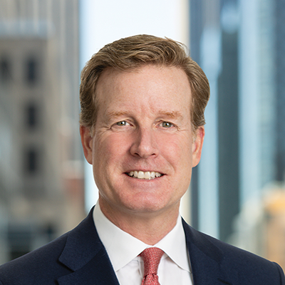 Headshot of Tim Vincent smiling at the camera.