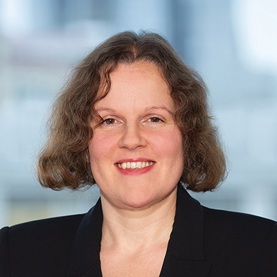 Headshot of Jo Warren smiling at the camera.