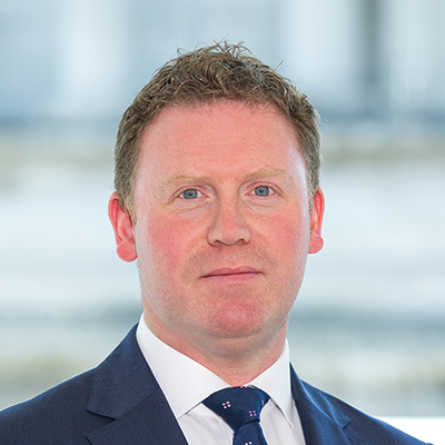 Headshot of James Whittaker looking at the camera.
