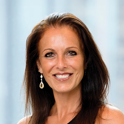 Headshot of Tamara Williams smiling at the camera.