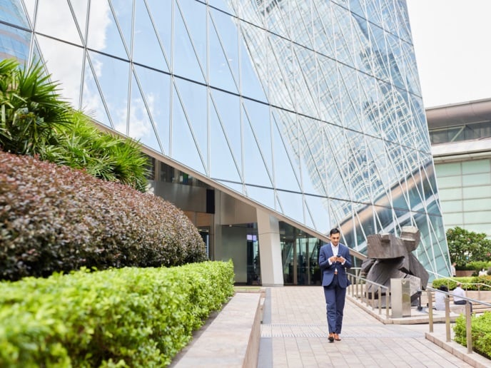 Barings colleague walking outside of our offices in APAC.