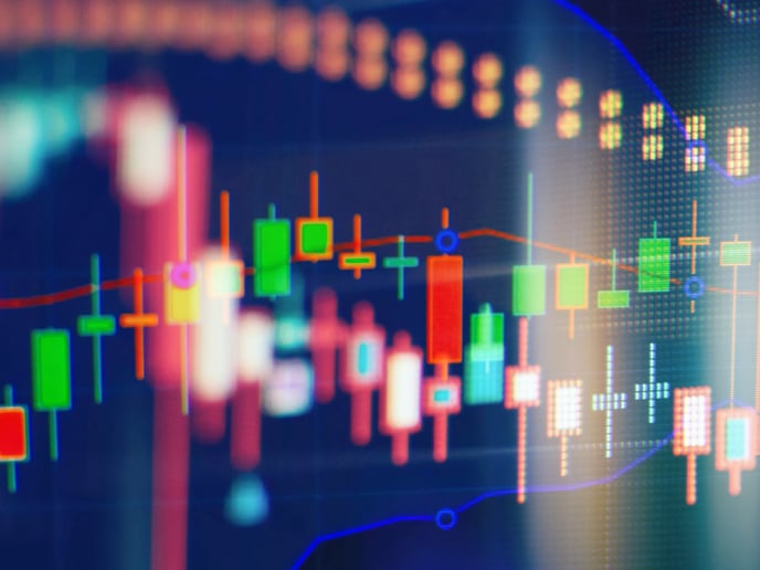 Abstract financial markets composition featuring contrasting red and green bar chart shapes.