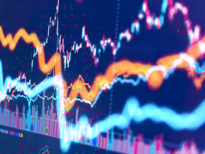 Abstract line chart composition with blue, purple and orange colors.