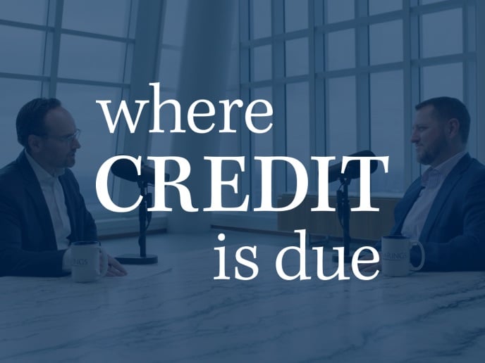 Two people recording a podcast,.