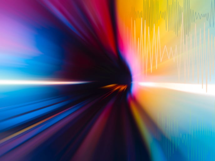 Abstract beams featuring red, green, blue and yellow colors.