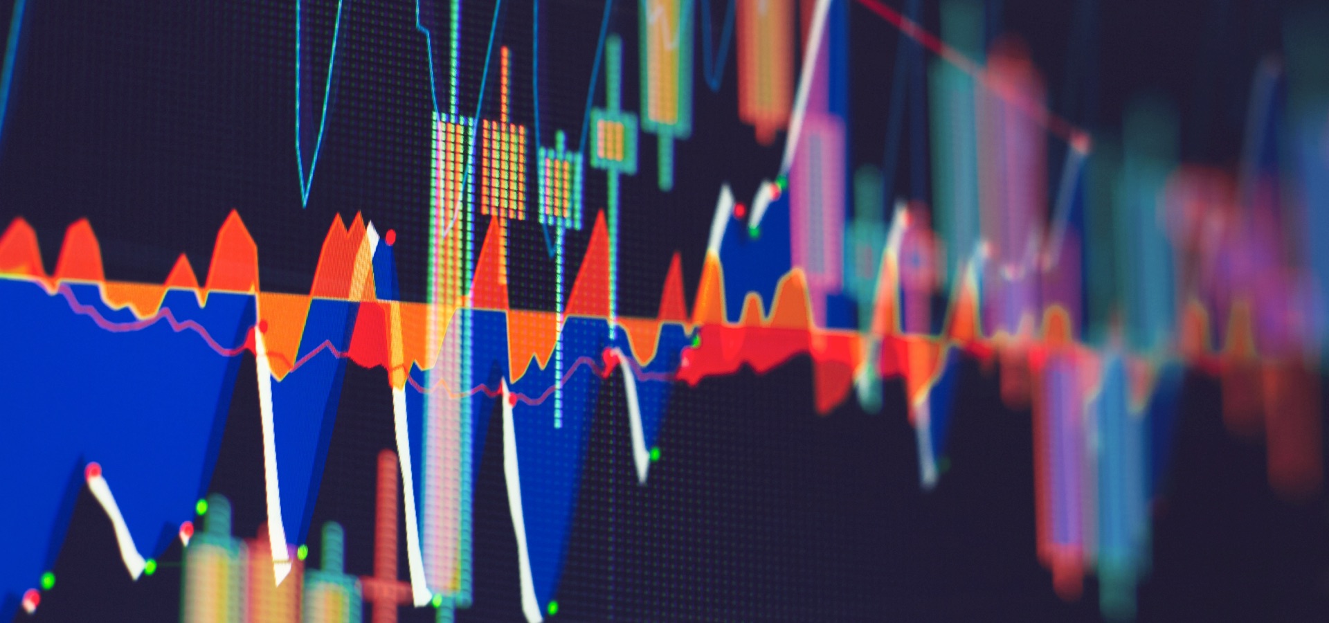Abstract financial chart with multicolored lines and bars showing market fluctuations on a dark background.