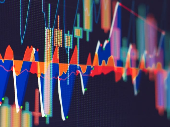 Abstract financial chart with multicolored lines and bars showing market fluctuations on a dark background.