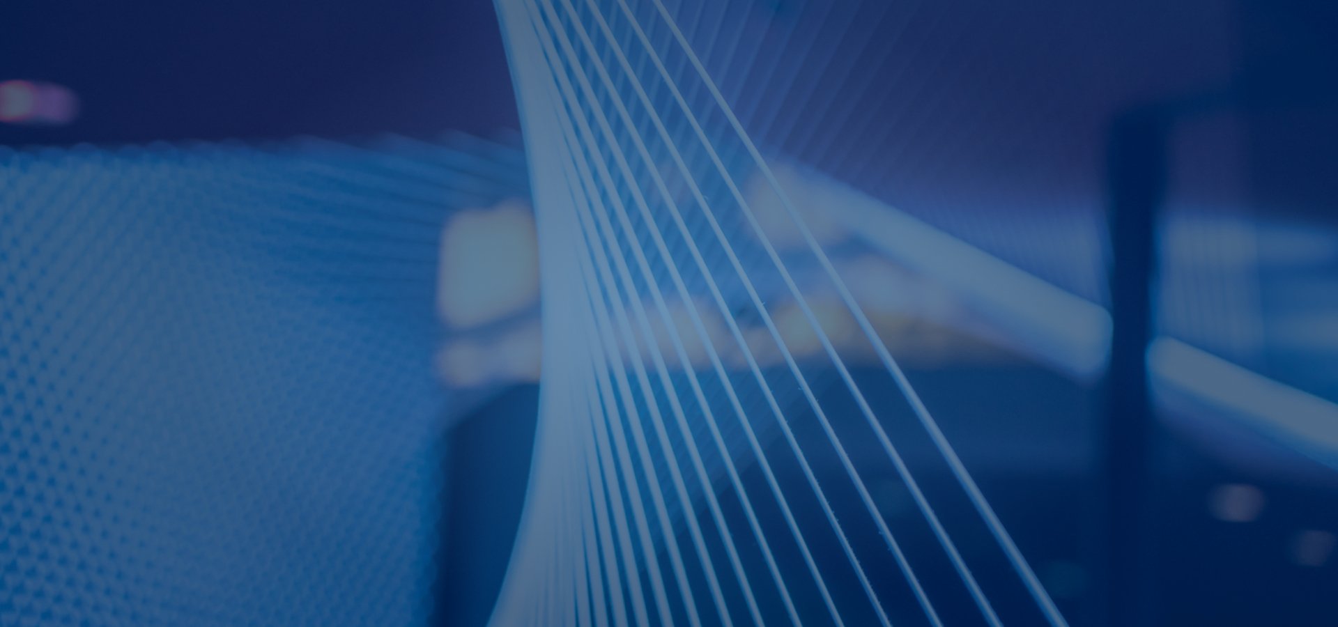 Abstract lines featuring blue and purple colors.