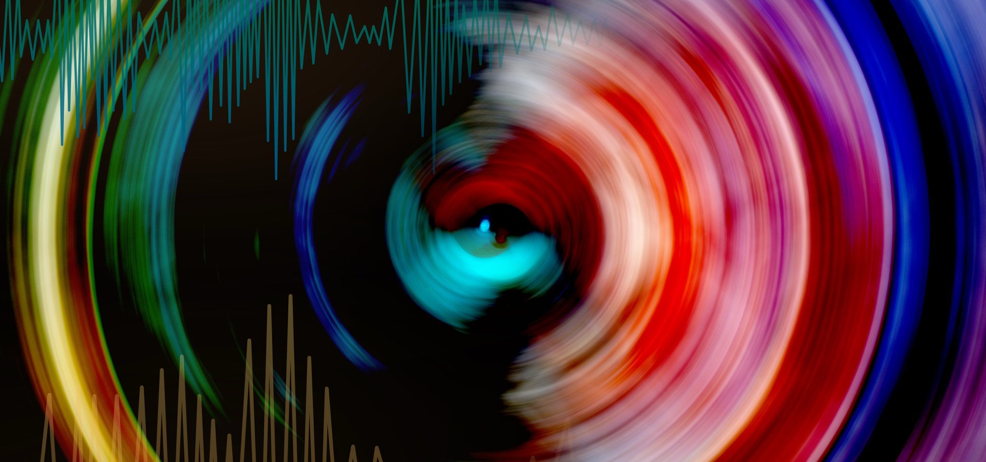 Abstract colorful rings featuring red, green and yellow colors.