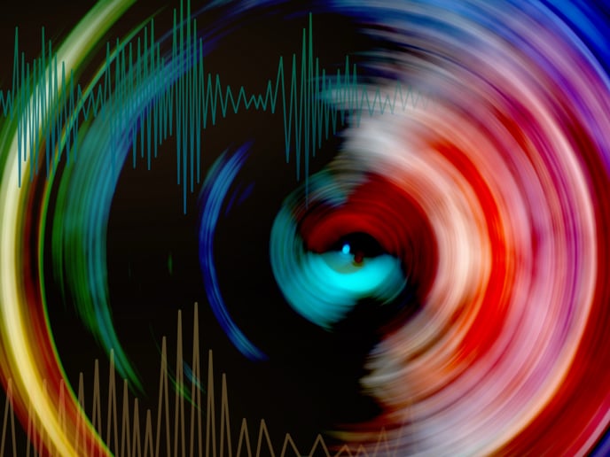 Abstract colorful rings featuring red, green and yellow colors.