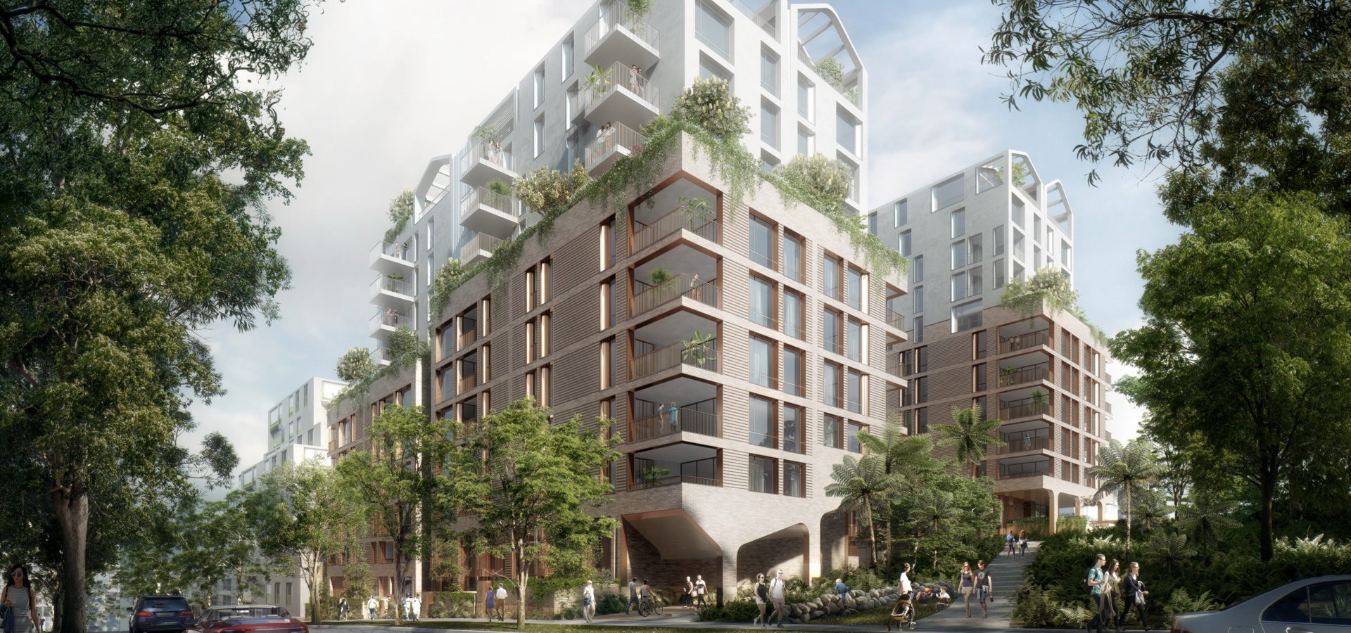 A residential building with trees and people walking around.
