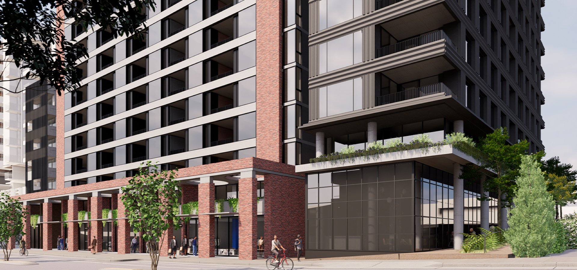 A residential building with people walking in front.