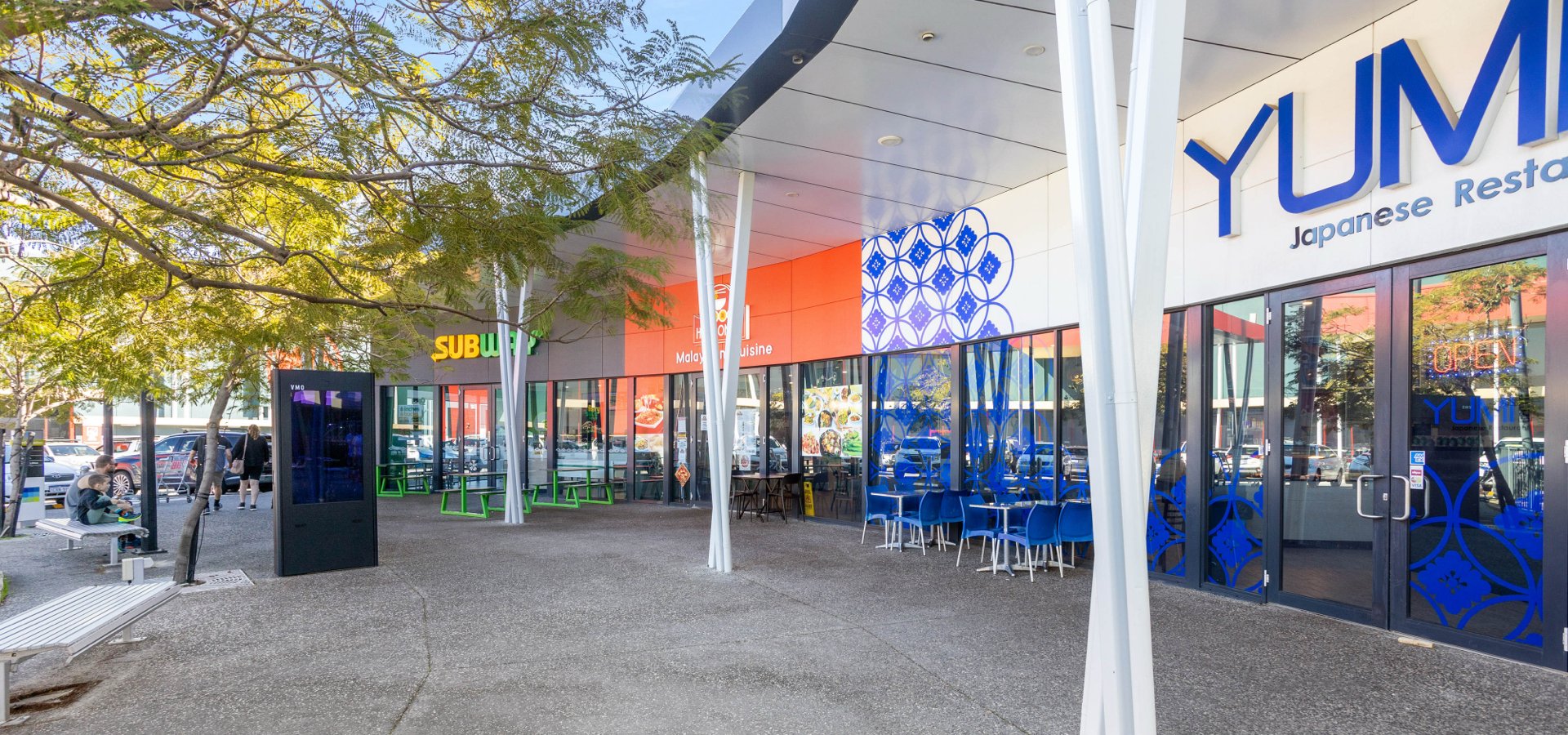 A shopping center with multiple business.