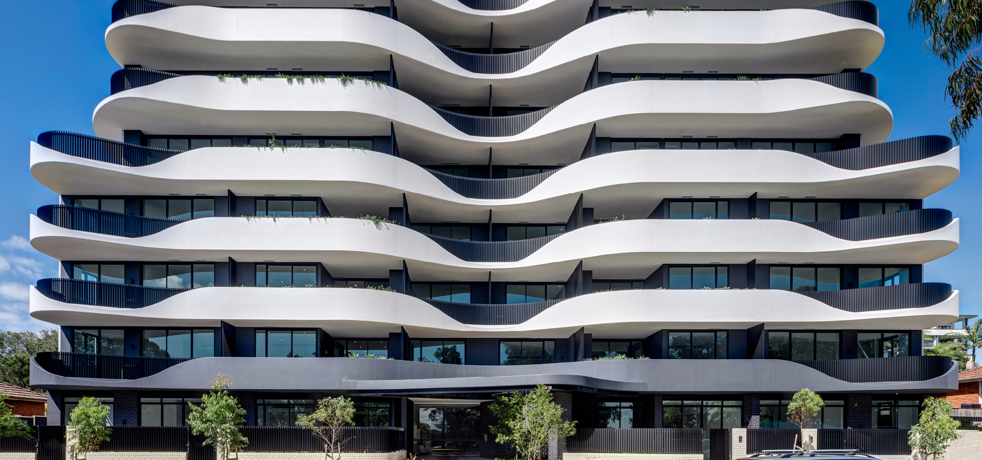 A building with curved balconies.